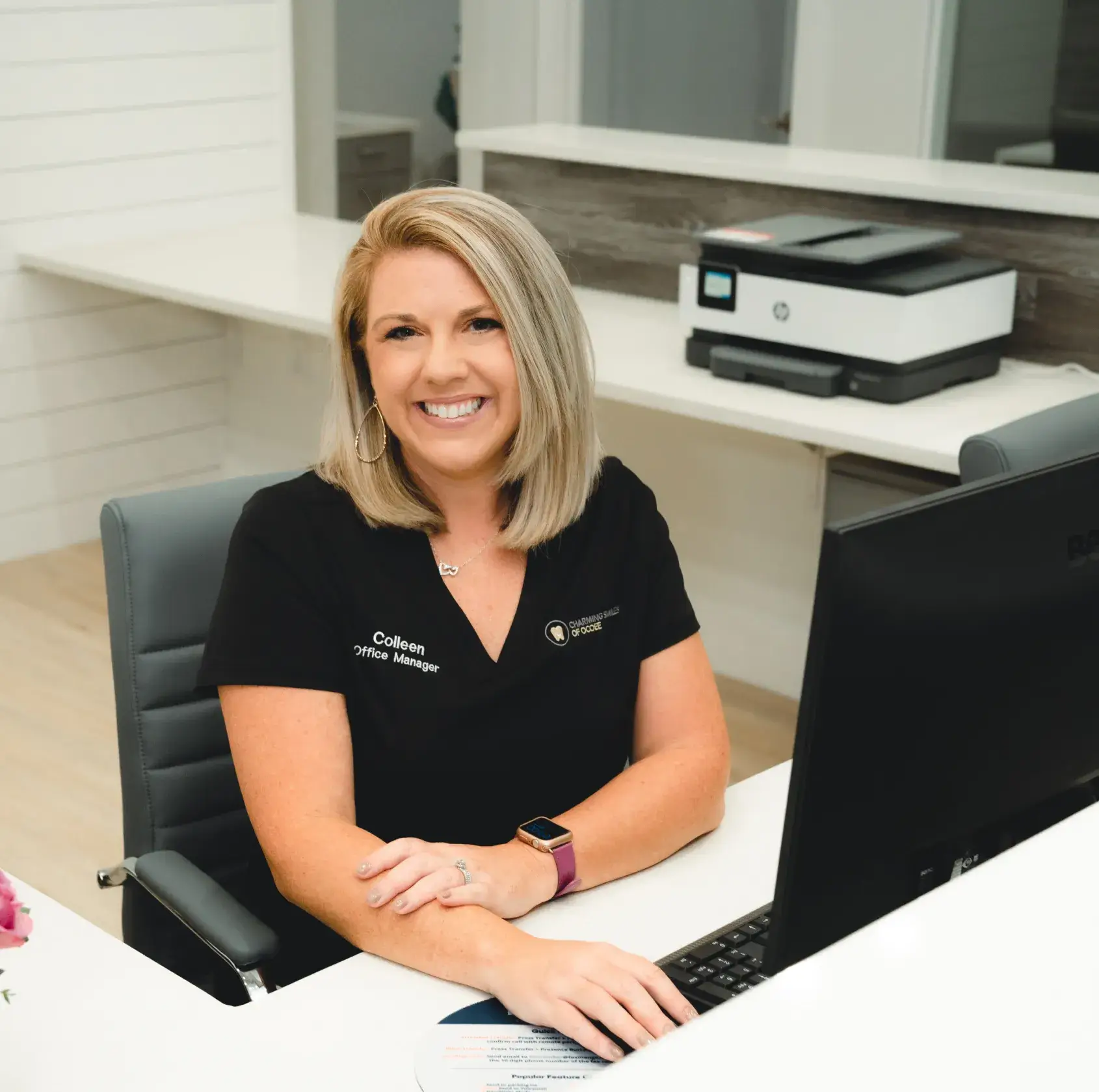 Friendly front-desk welcome at Charming Smiles of Ocoee